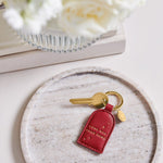 'Love Has Four Paws' Boxed Keyring | Garnet Red